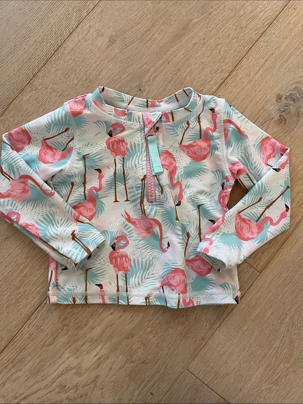 Ruffle Butts Pink & Aqua Flamingo Zip Rash Guard swim top